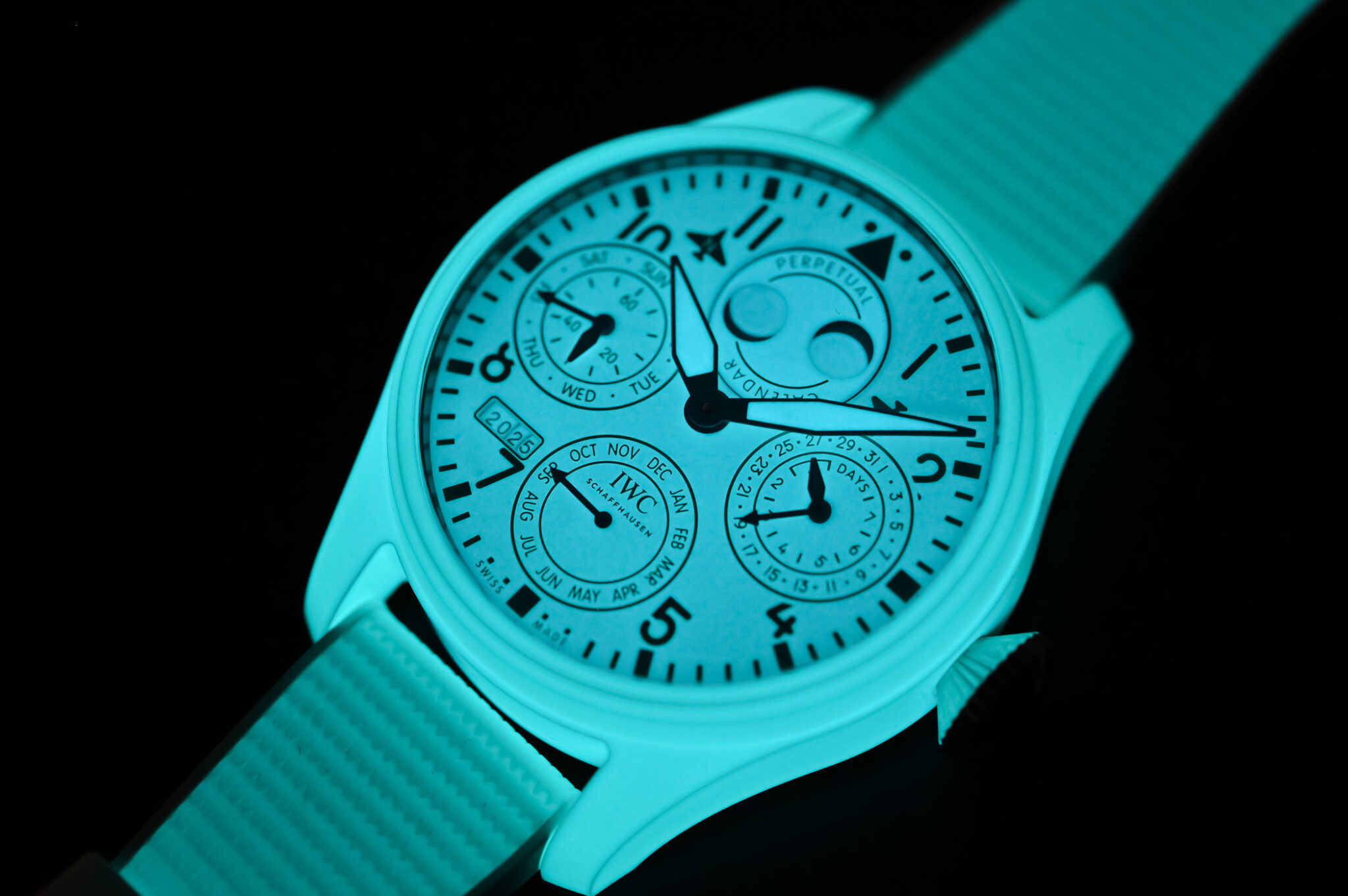 IWC Big Pilot Perpetual Calendar Ceralume IW505801 glowing blue in darkness