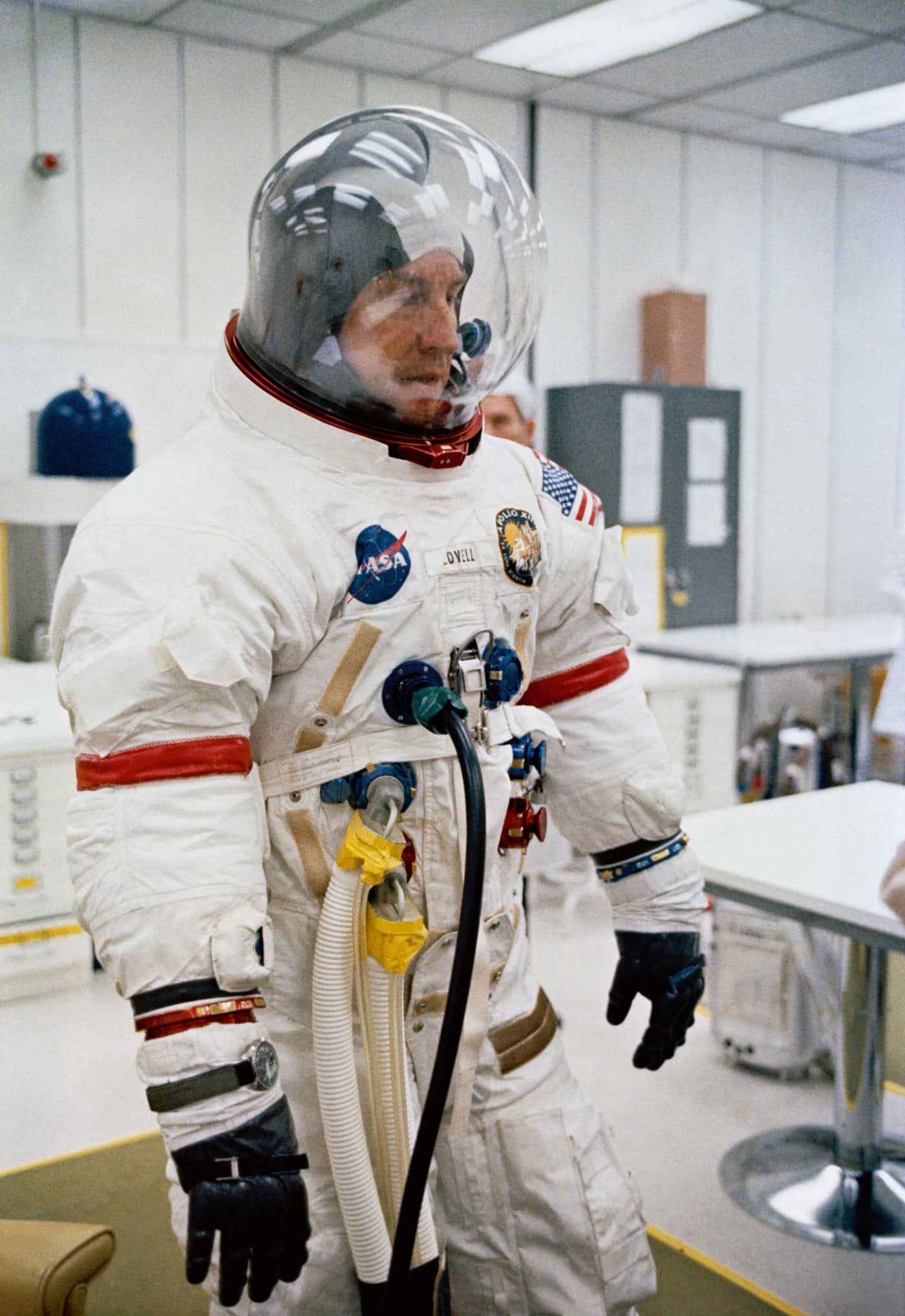 Jim Lovell, Apollo 13 Mission Commander, preparing for the launch, his Omega Speedmaster strapped around his flying suit.