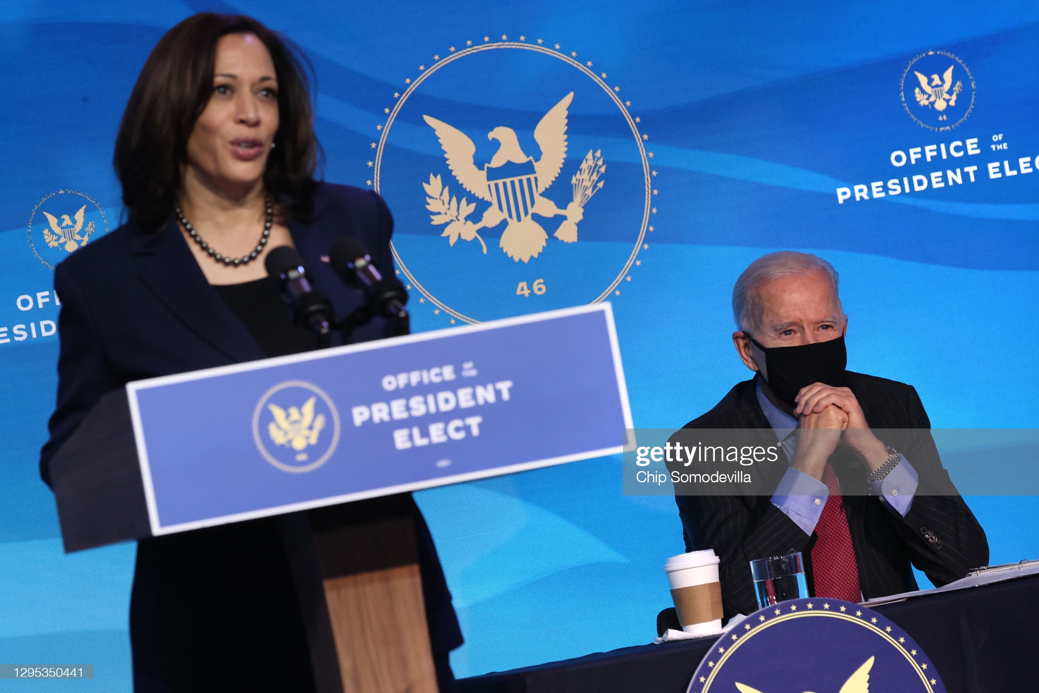 WILMINGTON, DELAWARE - JANUARY 08: U.S. President-elect Joe Biden (R) looks on as U.S. Vice President-elect Kamala Harris (L) delivers remarks after announcing nominees of his cabinet that will round out his economic team, including secretaries of commerce and labor, at The Queen theater on January 08, 2021 in Wilmington, Delaware. Biden announced he is nominating Rhode Island Gov. Gina Raimondo as his commerce secretary, Boston Mayor Martin J. Walsh his labor secretary and Isabel Guzman, a former Obama administration official, as head of the Small Business Administration. (Photo by Chip Somodevilla/Getty Images)