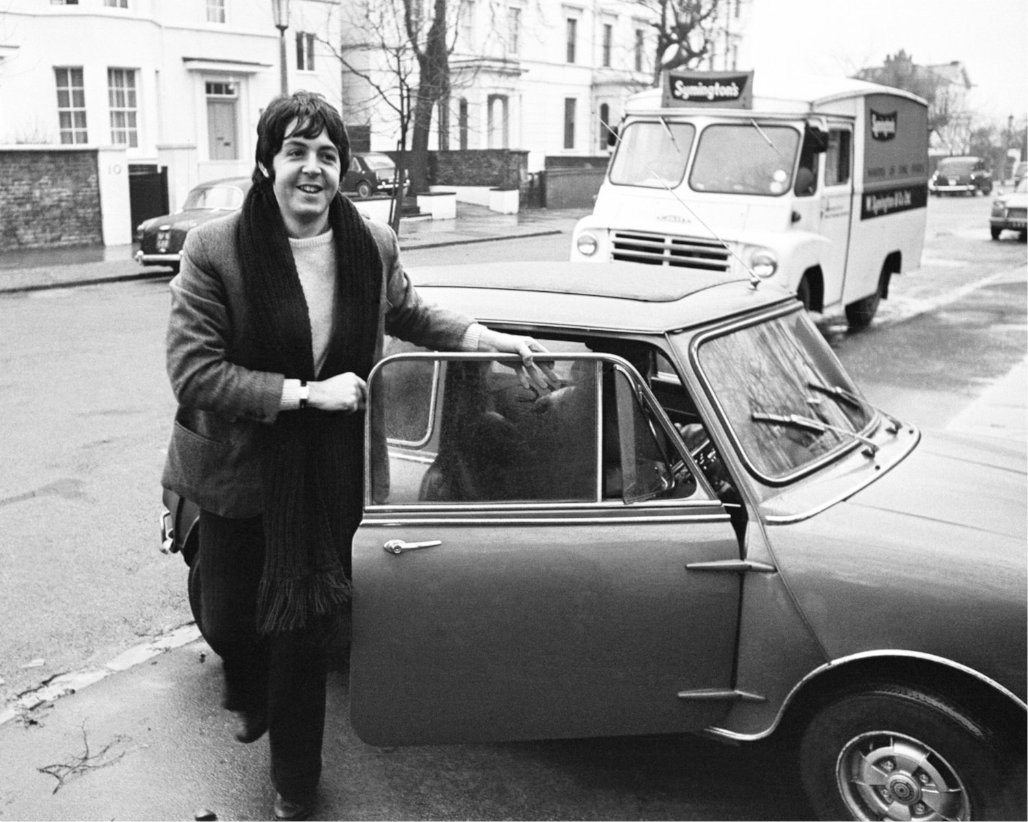Paul McCartney of The Beatles with his Radford Mini - Photo by Radford, sourced from Hagerty.com