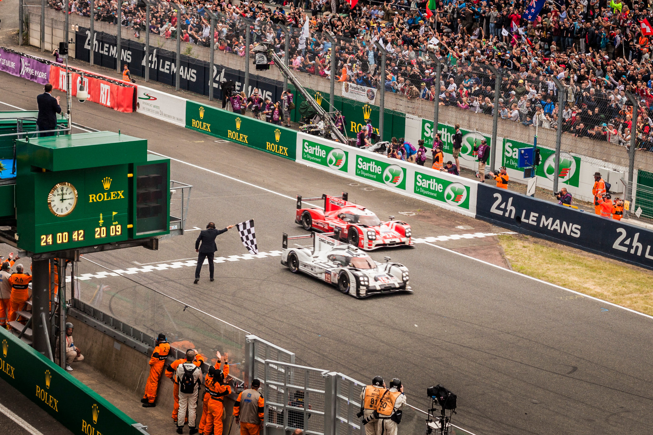 24 Hours of Le Mans - 2015 Edition - Two Porsche 919 Hybrids crossing the line to claim the manufacturer's 17th overall victory